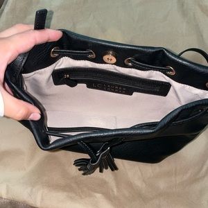 Lauren Conrad black and gold bucket bag